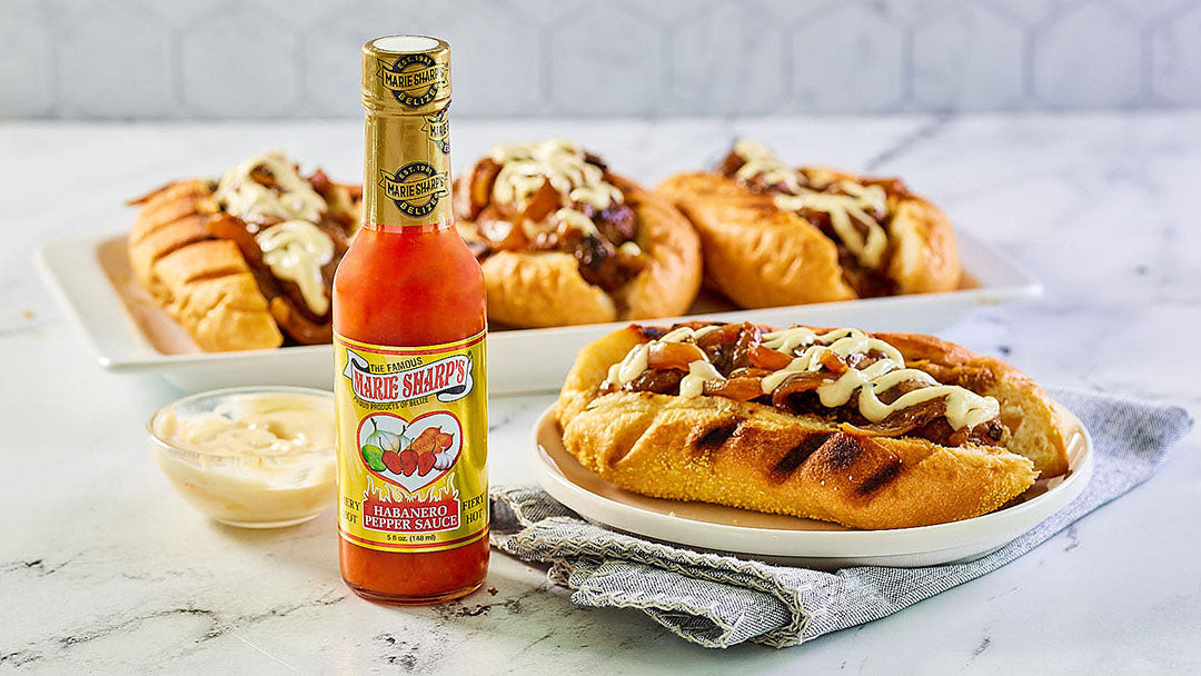 Spicy Beer Brats with Onions with Marie Sharp’s Fiery Habanero Pepper Sauce