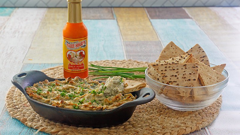 Spicy Artichoke Dip Recipe with Marie Sharp’s Garlic Habanero Pepper Sauce - The Pepper Pantry (Formerly Marie Sharp's)