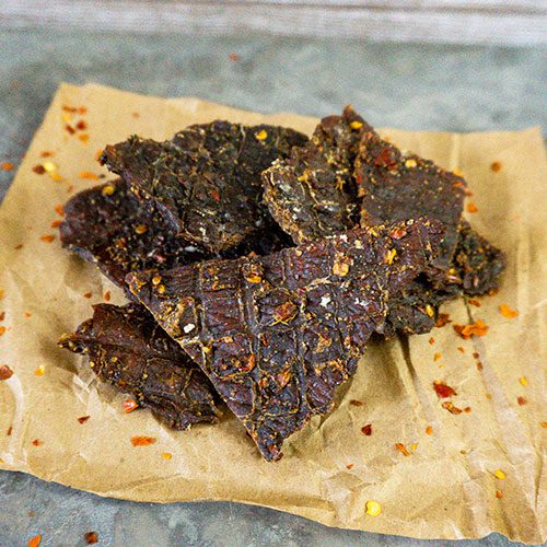 Sale Close Dated | Red Pepper Beef Jerky | 1.5 oz. Bag | Black Pepper With Hint Of Brown Sugar | Tender | Expertly Cut, Trimmed, & Seasoned | All Natural | Nebraska Jerky | Perfect Everyday Snack